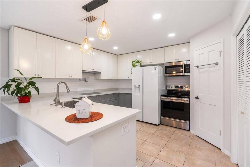 The chef of the home will enjoy cooking with stainless steel appliances! The storage continues with a large pantry!