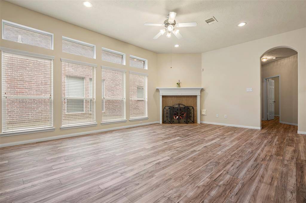 Another view of family with with lots of windows for natural lights