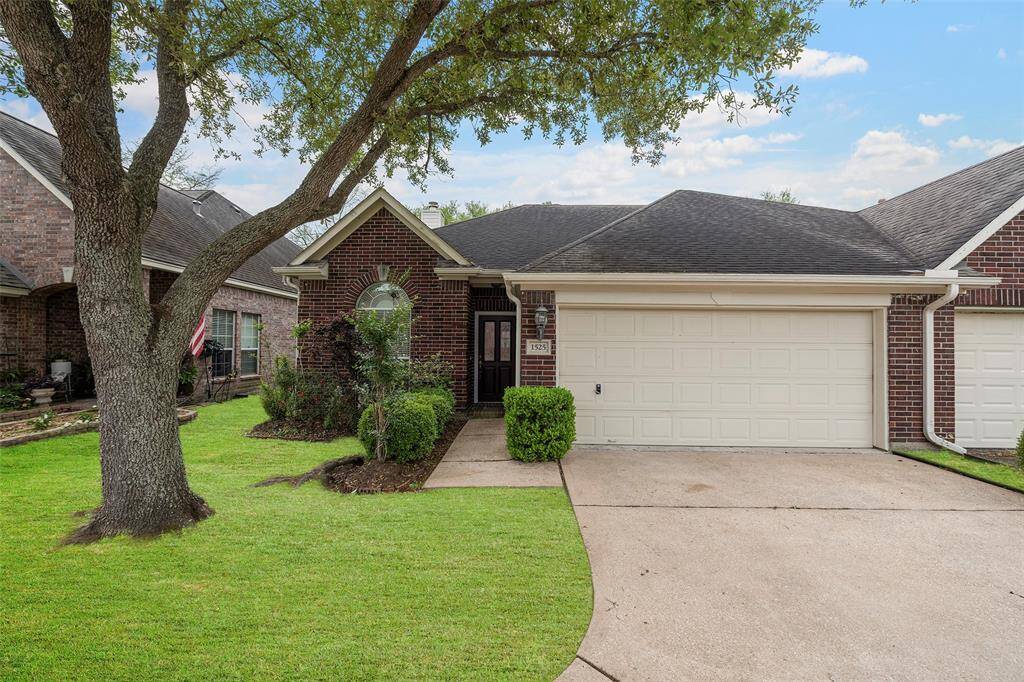 Front entrance and double driveway