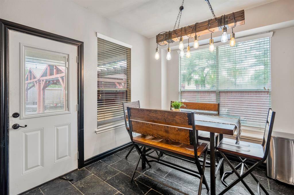 Enjoy casual meals or sip your morning coffee in the cozy eat-in dining area just off the kitchen—a perfect spot to start or end your day.