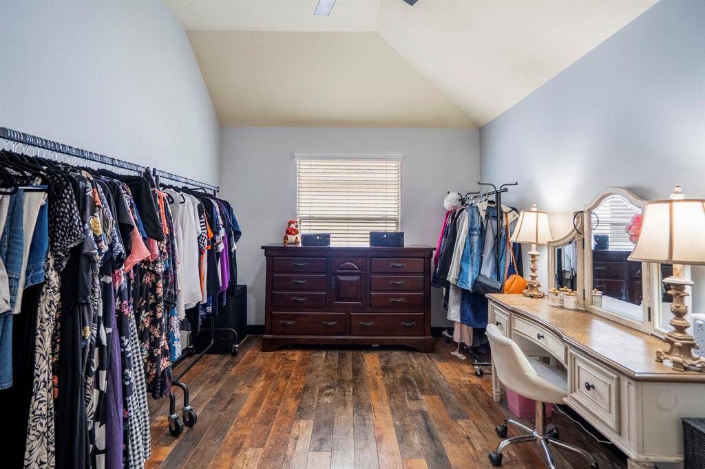 Bedroom 3, currently styled as a chic dressing room, measures 14.6 x 11.9 and offers plenty of space and flexibility—perfect for a guest room, home office, or keeping it as your personal glam space.