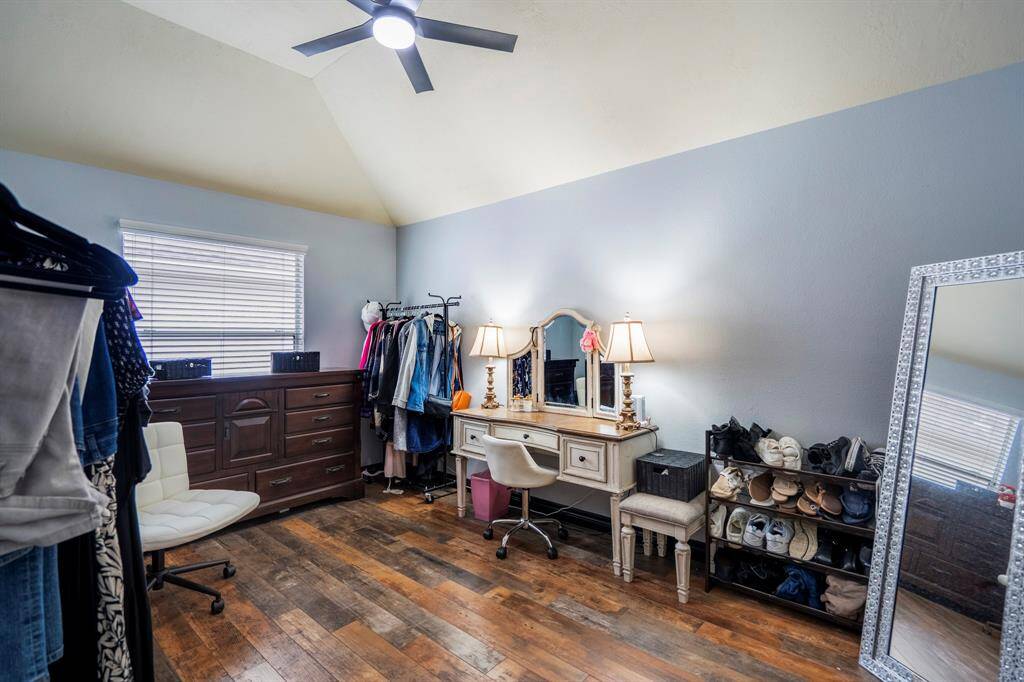 Bedroom 3, currently styled as a chic dressing room, measures 14.6 x 11.9 and offers plenty of space and flexibility—perfect for a guest room, home office, or keeping it as your personal glam space.