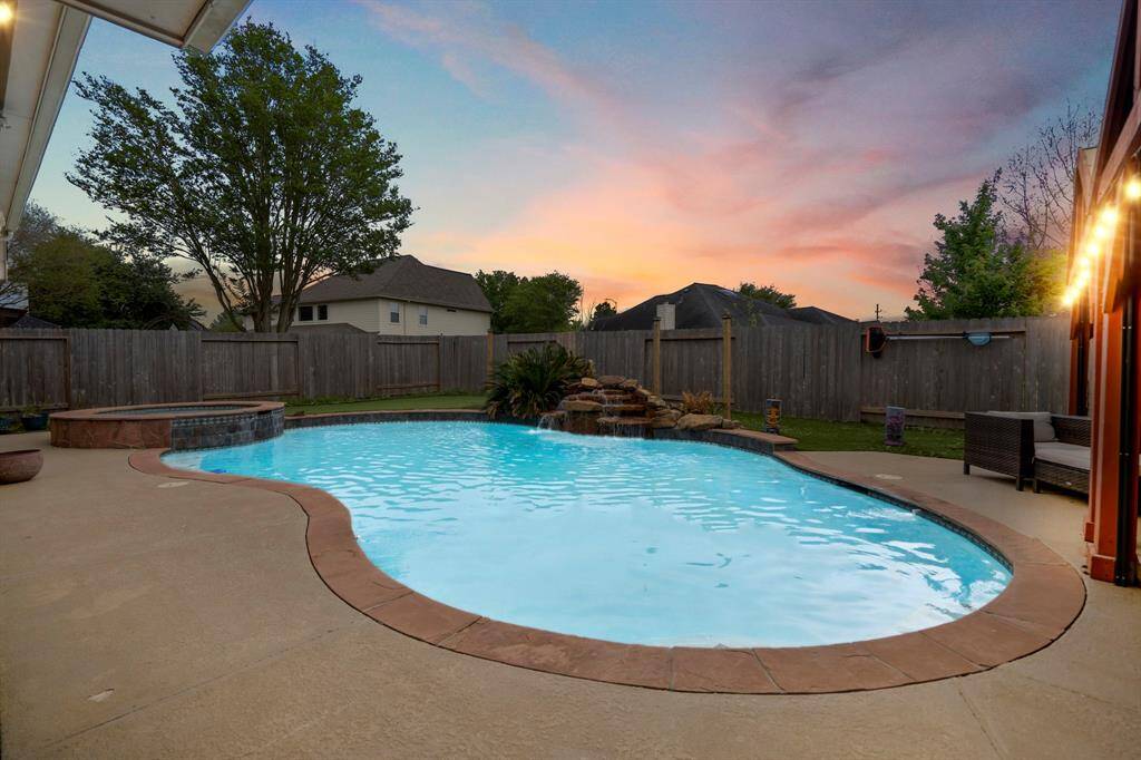 This is where the fun begins—your own private backyard oasis! Dive into the heated pool, relax in the hot tub, or unwind under the covered pergolas equipped with electricity. Practice your short game on the putting green, and enjoy the low-maintenance lifestyle with lush astro turf that keeps things looking pristine year-round.