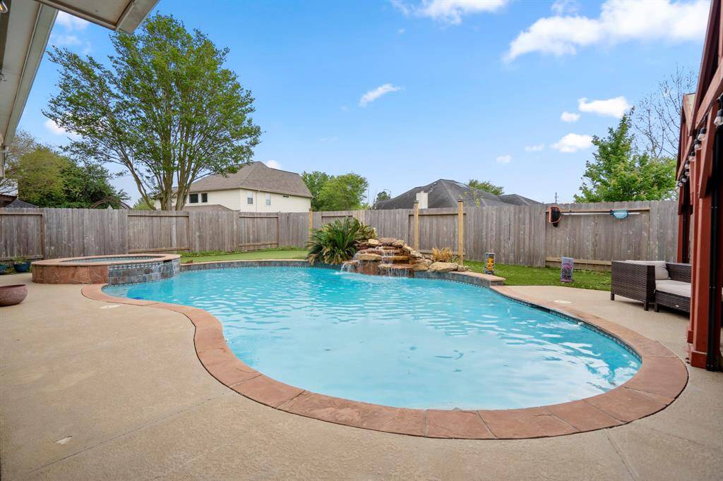 This is where the fun begins—your own private backyard oasis! Dive into the heated pool, relax in the hot tub, or unwind under the covered pergolas equipped with electricity. Practice your short game on the putting green, and enjoy the low-maintenance lifestyle with lush astro turf that keeps things looking pristine year-round.