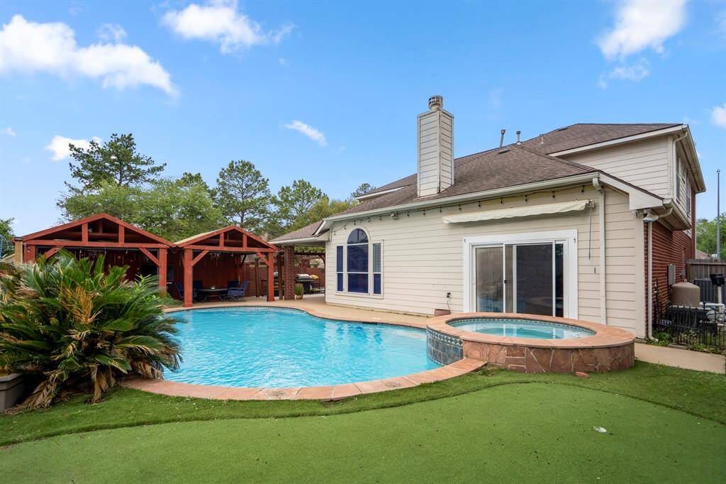 This is where the fun begins—your own private backyard oasis! Dive into the heated pool, relax in the hot tub, or unwind under the covered pergolas equipped with electricity. Practice your short game on the putting green, and enjoy the low-maintenance lifestyle with lush astro turf that keeps things looking pristine year-round.