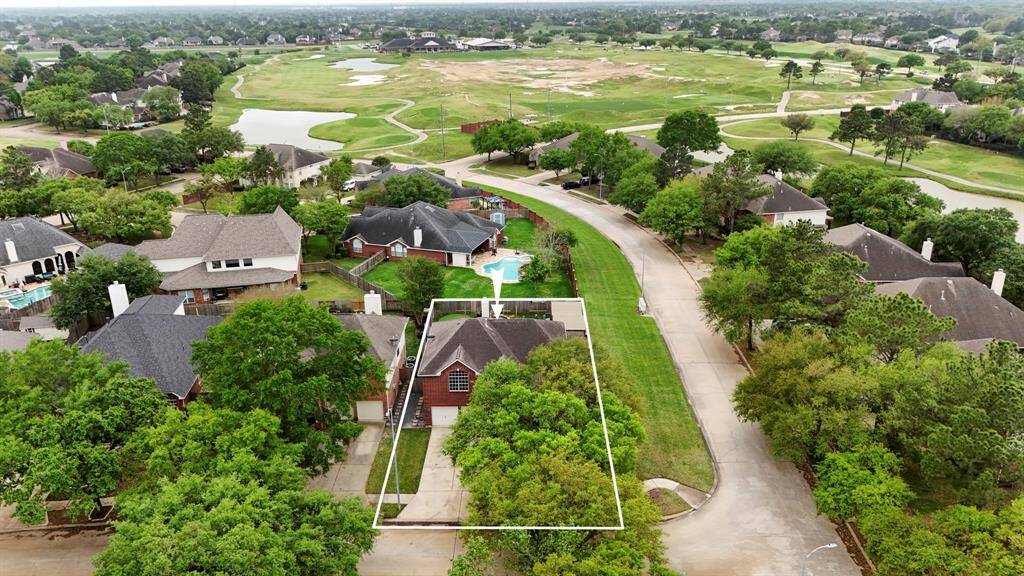 Golf lover’s dream—this home is just steps away from Houston National Golf Club, so you can hit the greens anytime the mood strikes
