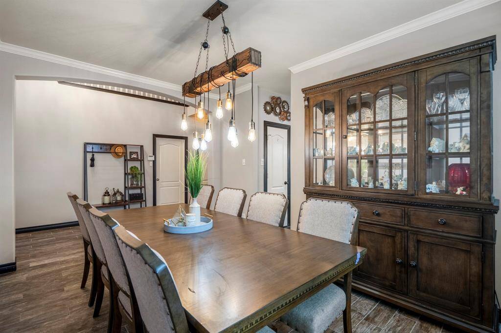 Spacious dining room easily accommodates a large table with plenty of room for a buffet, china cabinet, or other statement pieces—perfect for hosting gatherings both big and small.