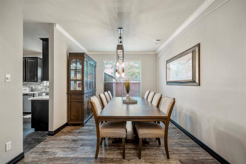 Spacious dining room easily accommodates a large table with plenty of room for a buffet, china cabinet, or other statement pieces—perfect for hosting gatherings both big and small.