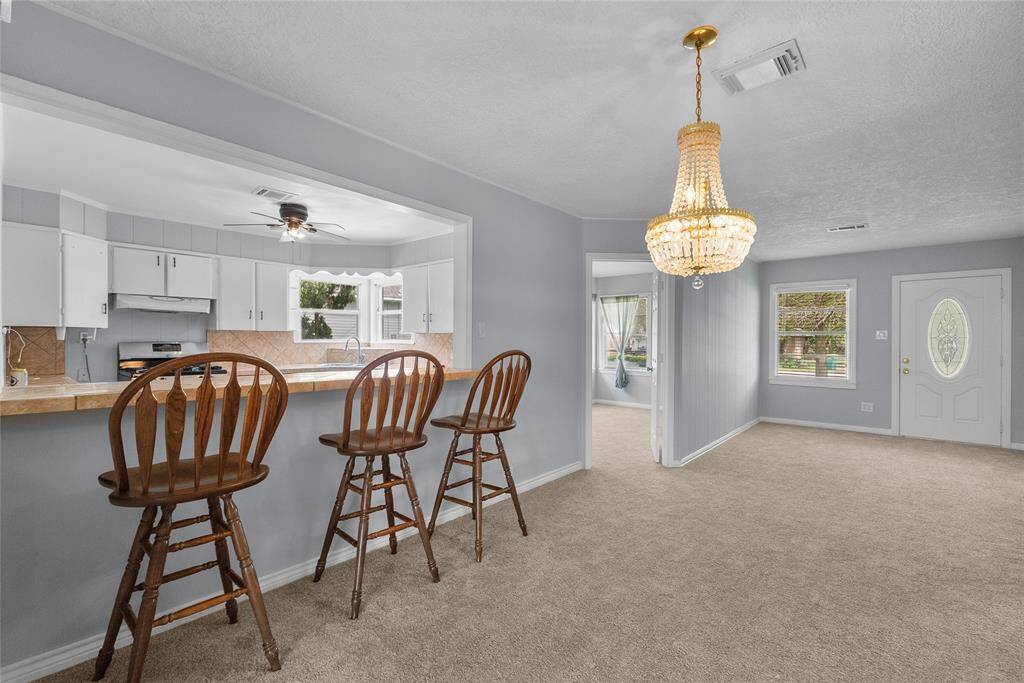 The breakfast bar offers extra space for entertaining.