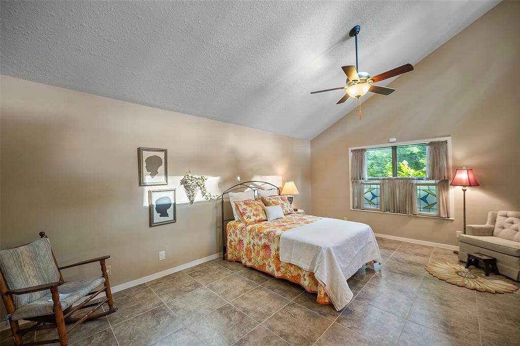 Welcome to your primary retreat! This light filled room is warm and inviting with neutral tones and plenty of space for all your needs!