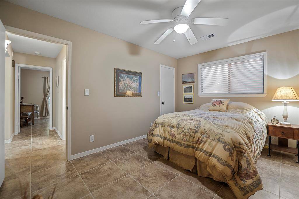 Plenty of room with neutral tones, and more of the beautiful ceramic tile flooring!