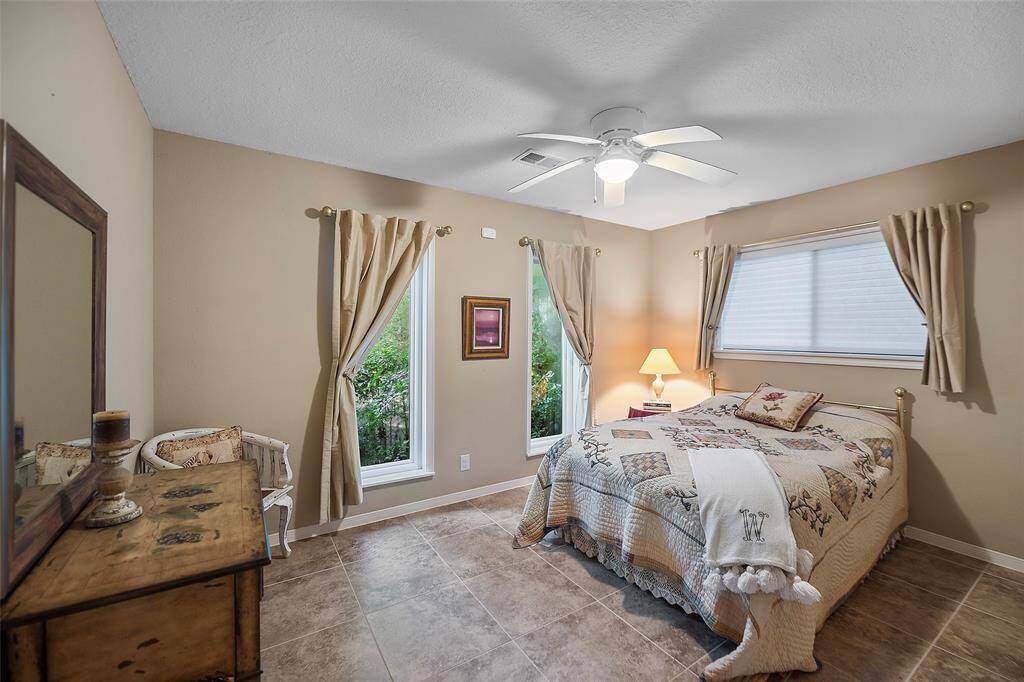 And the last of the secondary bedrooms! Beautiful windows allow for even more beautiful views! This space would make a great home office, workout space, yoga or art studio! So many possibilities!