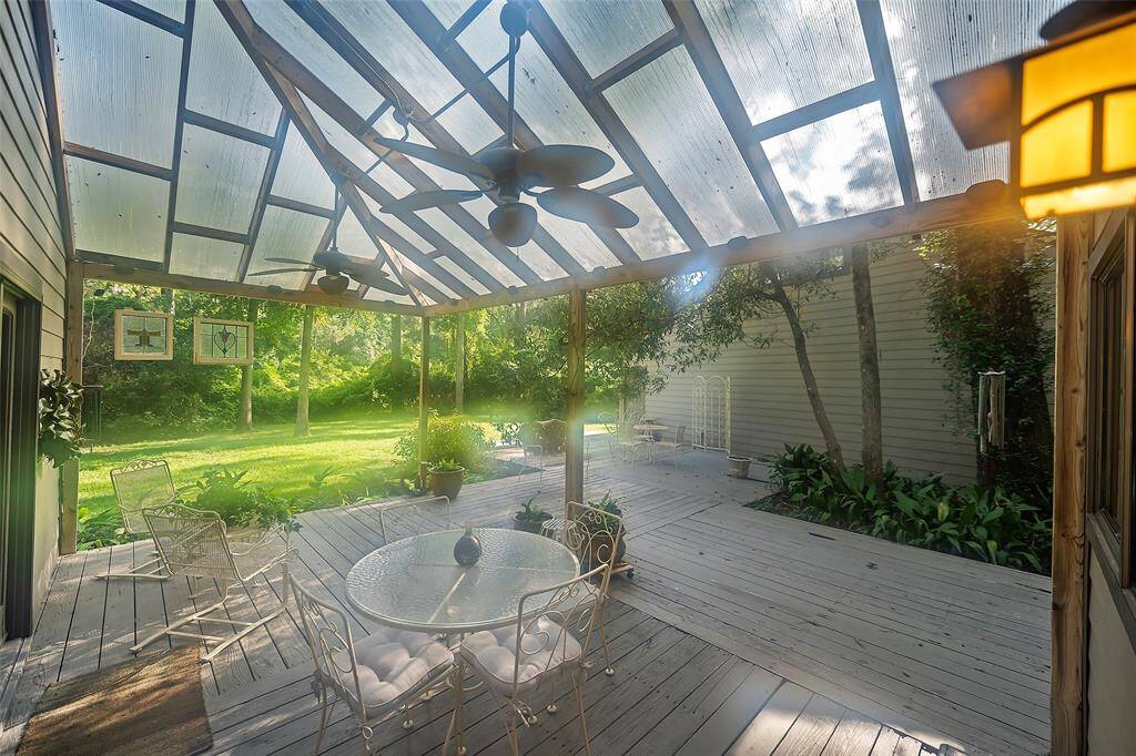 Back downstairs, we step outside onto a covered decking area, ready for nights of dining al fresco, or morning cups of coffee listening to the birds sing!