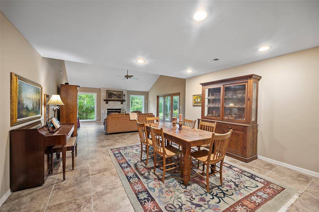 Pretty ceramic tile flooring flows throughout most of the home creating a seamless look, and is so easy to maintain!
