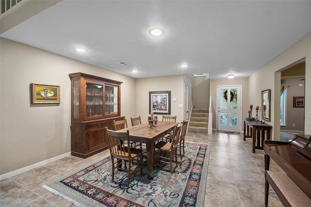 This dining area is the perfect space for holiday meals or playing cards with friends well into the night!