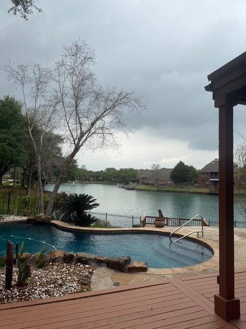 Breathtaking ! Enjoy your evenings on this multilevel deck, patio, pool and waterfall. Perfect for entertaining !