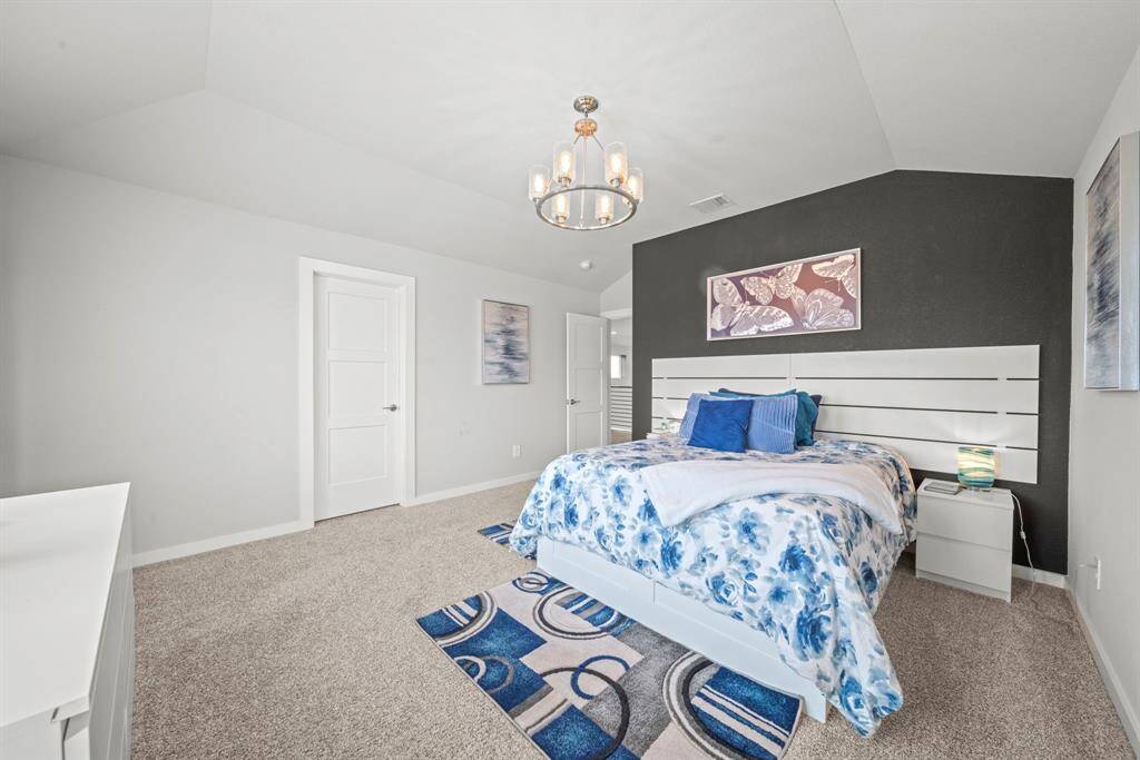 Another peek at bedroom with ensuite bath, cozy vibes and sweet dreams.