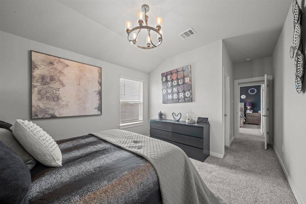 Upstairs Bedroom #2 brings cozy vibes and inspiring style—perfect for dreaming big and being your own hero!