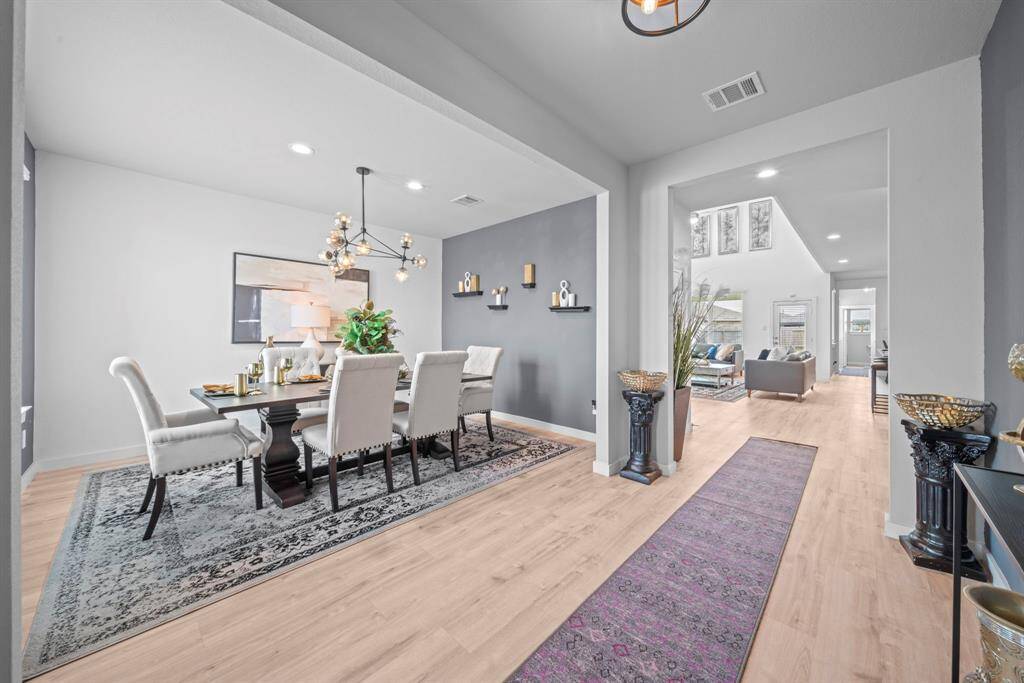 Enter the home, a wide and open entry way.
