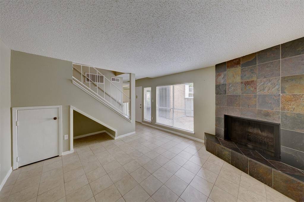 Great living area and additional storage space below stairs.