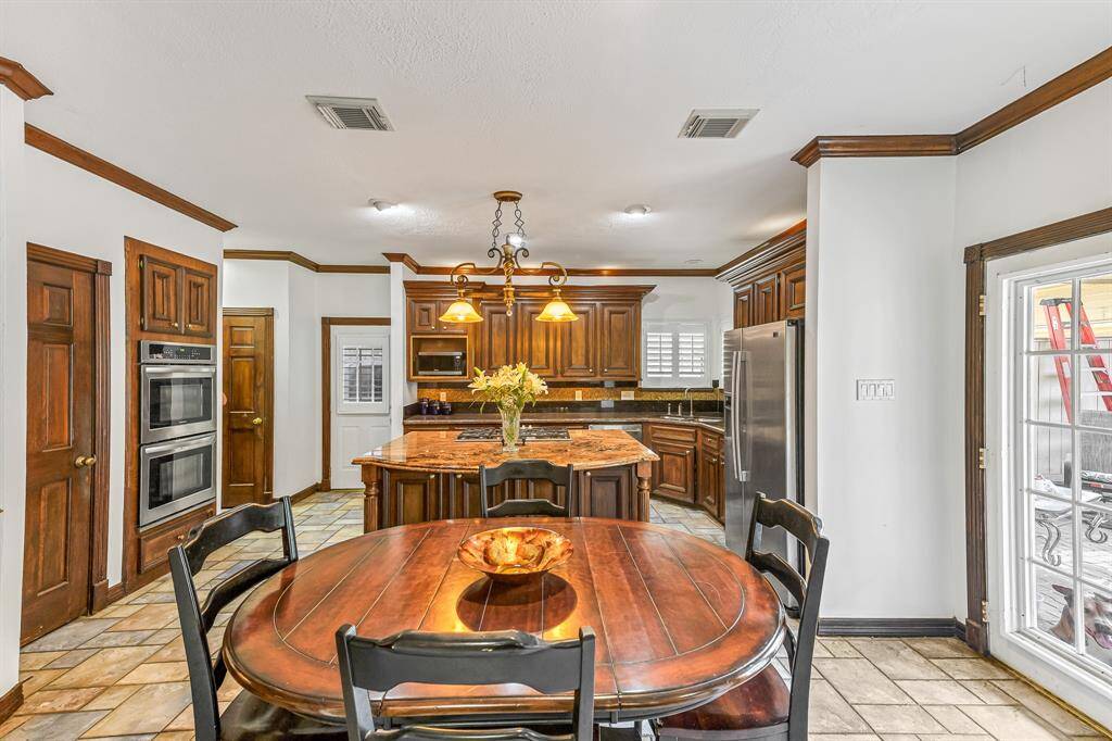 The kitchen in this home is a chef's dream, offering tons of storage and modern features designed to make cooking and entertaining a breeze.