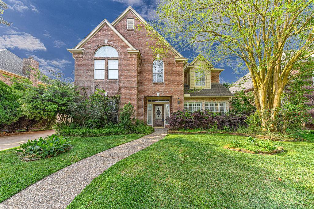 This home boasts over 3750 square feet and an almost 9000 square foot lot. Beautiful landscape is easy to maintain with the front yard sprinkler system