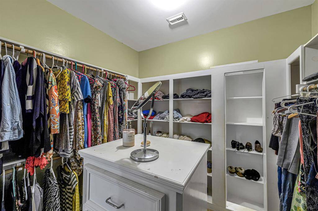 The largest of the secondary bedrooms is currently being used as an office