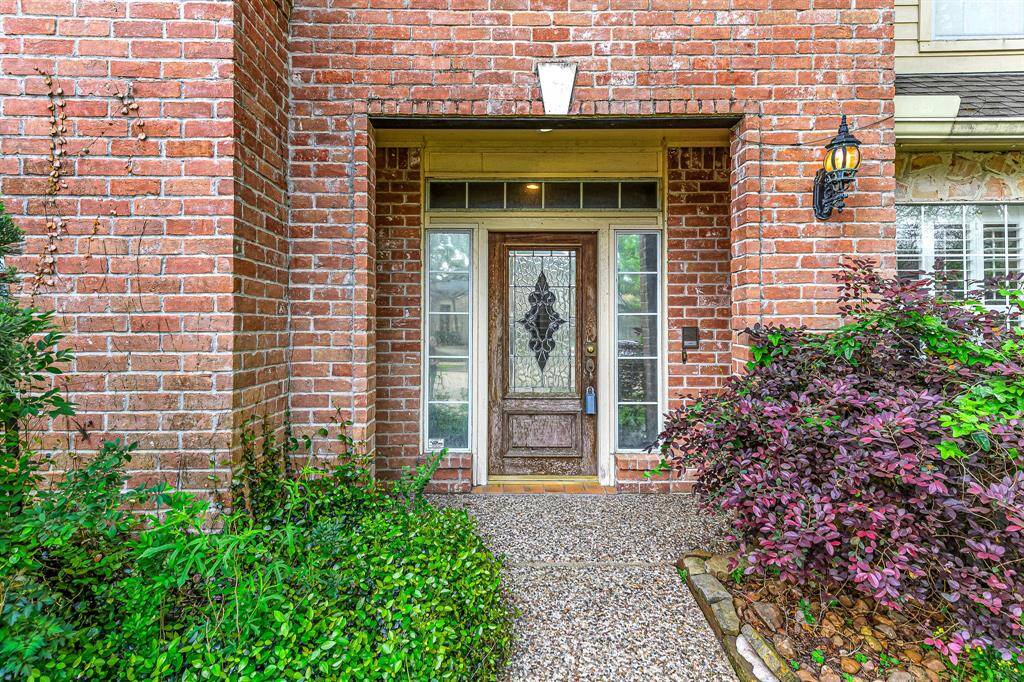Upon entering the home, you’re immediately greeted by the breathtaking sight of a grand curved staircase that serves as the focal point of the entryway