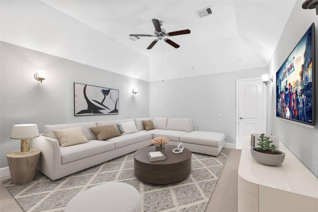 Media room is currently being used as a bedroom but this virtually staged picture gives you an idea of how you can use this space.