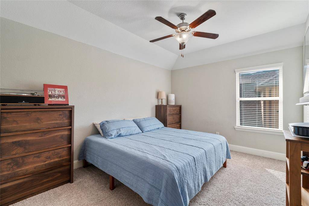 All secondary bedrooms have ceiling fans and large windows for extra light.