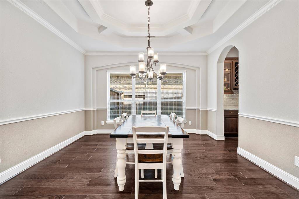 Another view of the formal dining that sits right off the entry and leads into the kitchen. This house has such a neutral palette, it can accommodate many different styles with no effort.