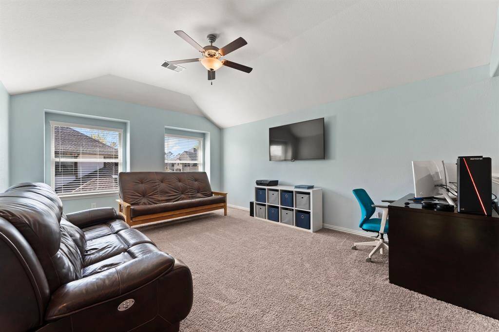 Upstairs you'll find a spacious game room!