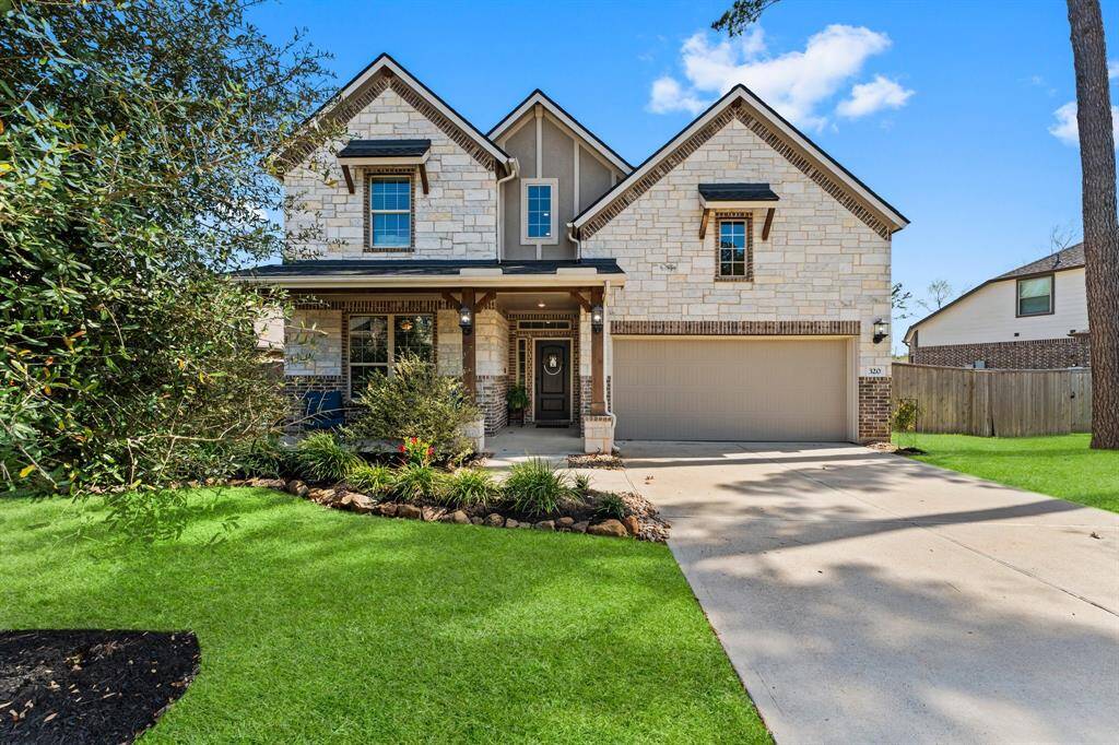 Covered front porch fits two rocking chairs and is a perfect spot for your morning coffee!