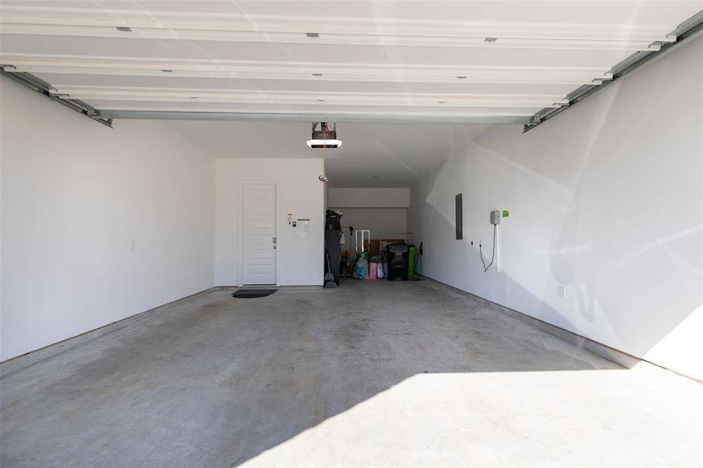 3 Car Garage with Wall Connector Hardwired Electric Vehicle