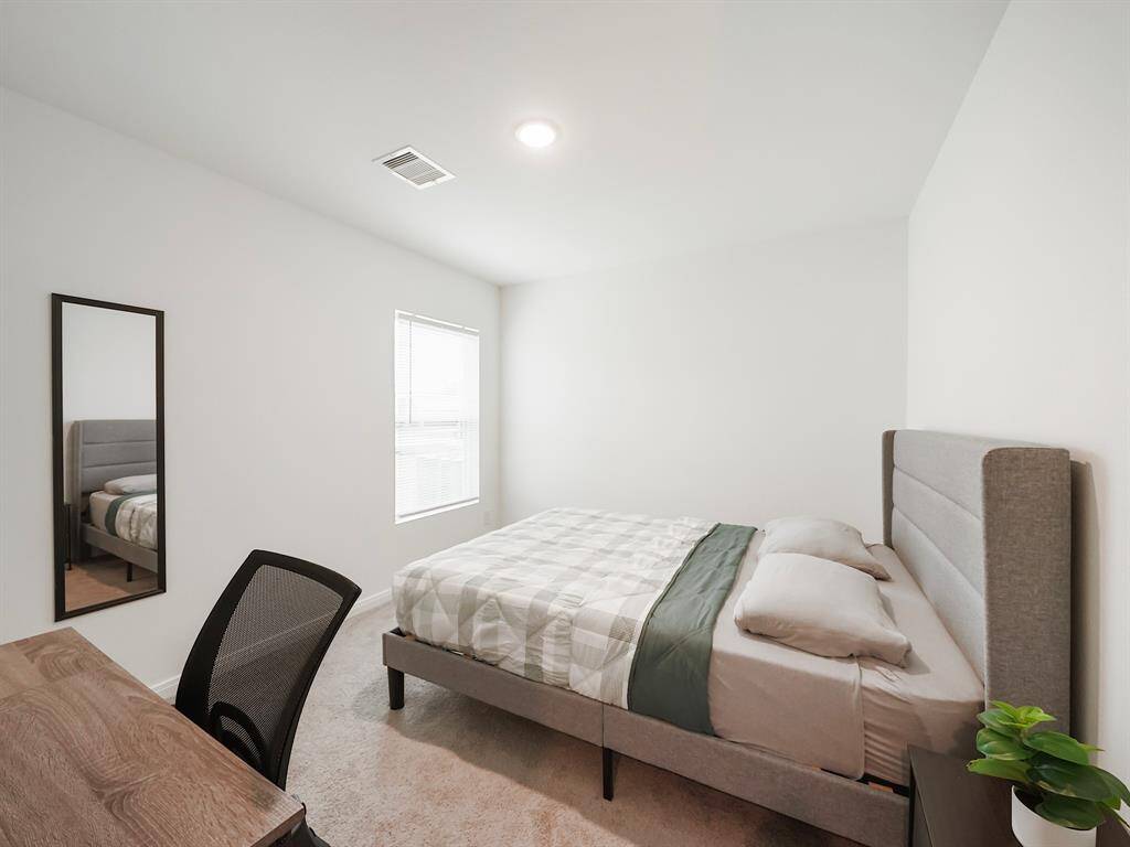 Secondary Bedroom #2 - Split floor plan- rooms in a hall in the middle of the home away from primary bedroom