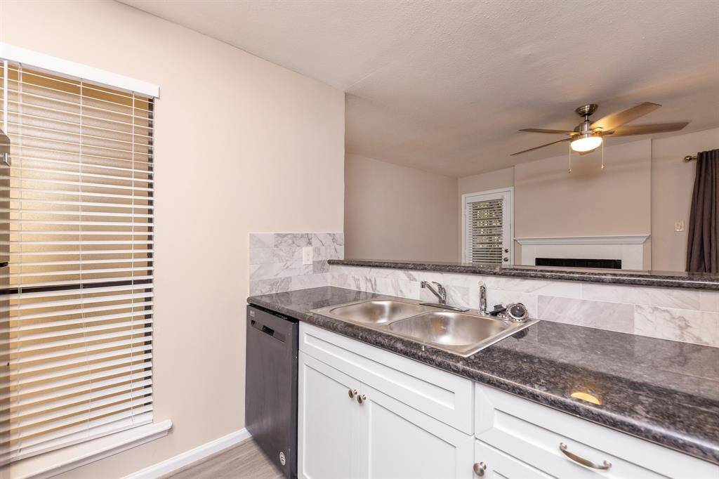 Looking out from the kitchen into the family room, this space is ideal for hosting guests.