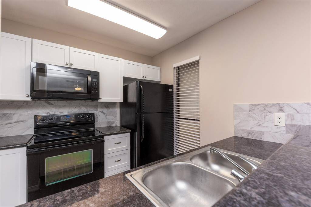 The granite countertops in this home are a wonderful feature.