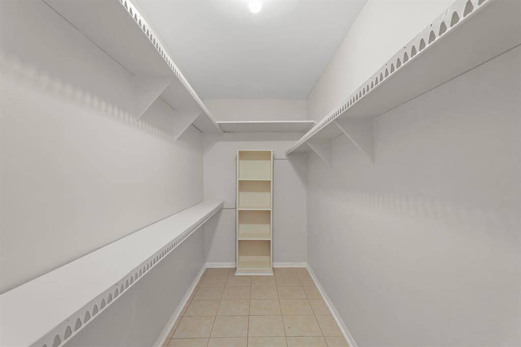 Spacious walk-in closet.