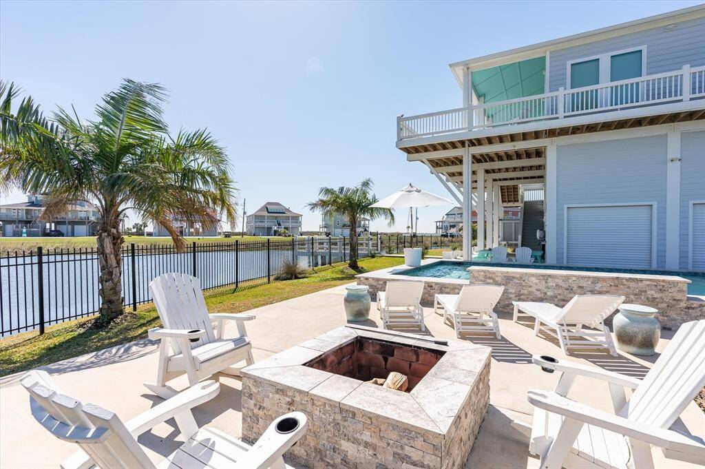 Great view of the pond, pool and fire pit