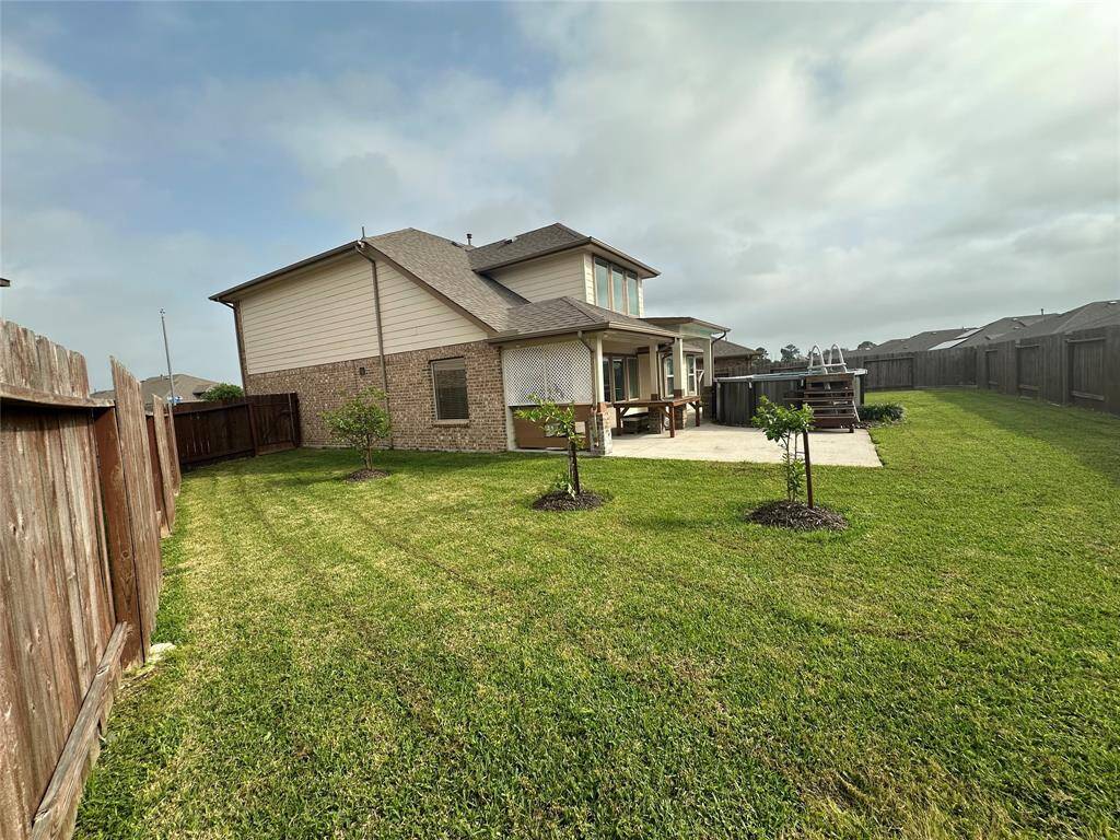 FULL VIEW OF THE FULLY FENCED BACKYARD. BACKYARD