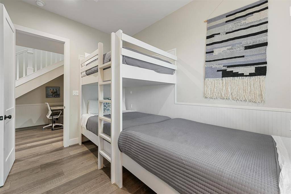 Fun and functional, this bunk room is perfect for creating memories. With built-in bunks, cozy finishes, and plenty of sleeping space, it’s an ideal spot for guests or kids to relax and enjoy their stay.