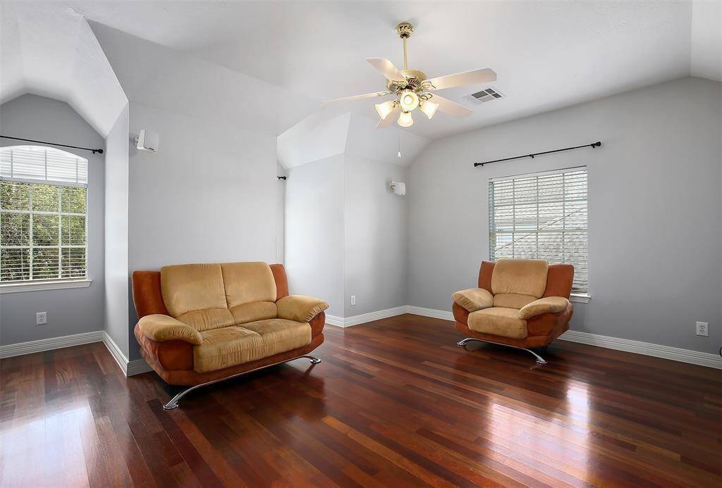 Bedroom 4 is a versatile, spacious room with cozy little nooks, great for a media room or your personalized space to relax and unwind