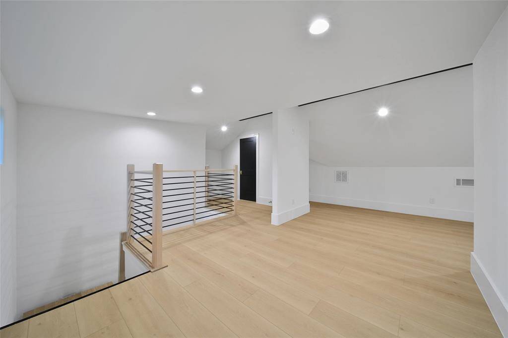 UPSTAIRS bonus room could be a studio, additional bedroom, or secondary office. Full bath attached, and great attic storage space.