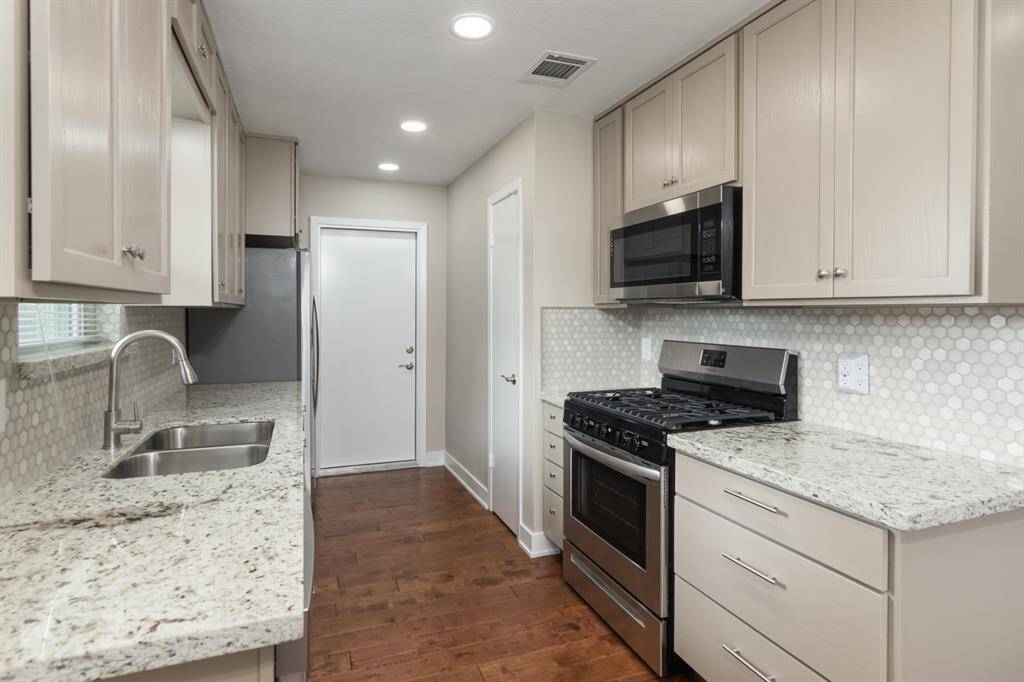 Great cabinets with deep pot drawers.