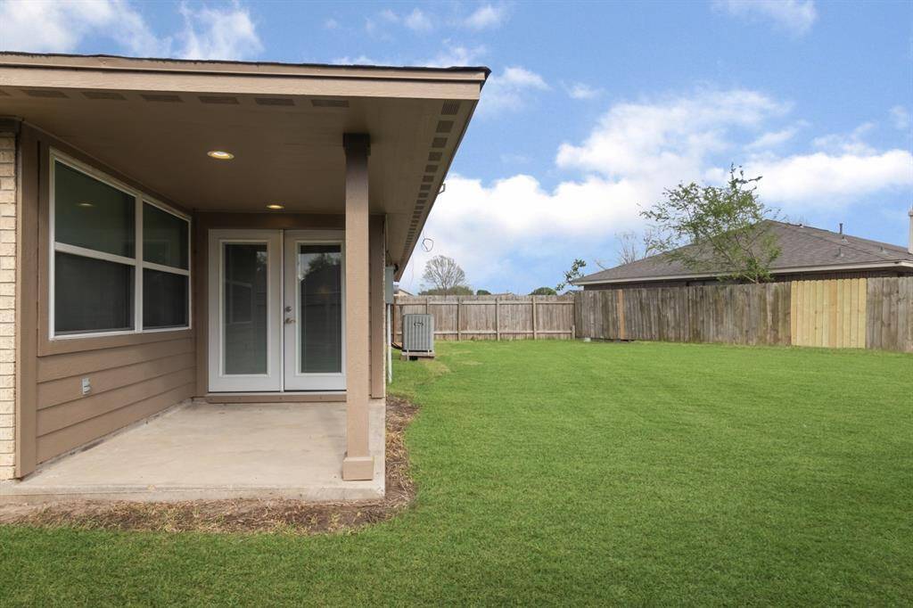 Covered patio to sit and watch kids at play.