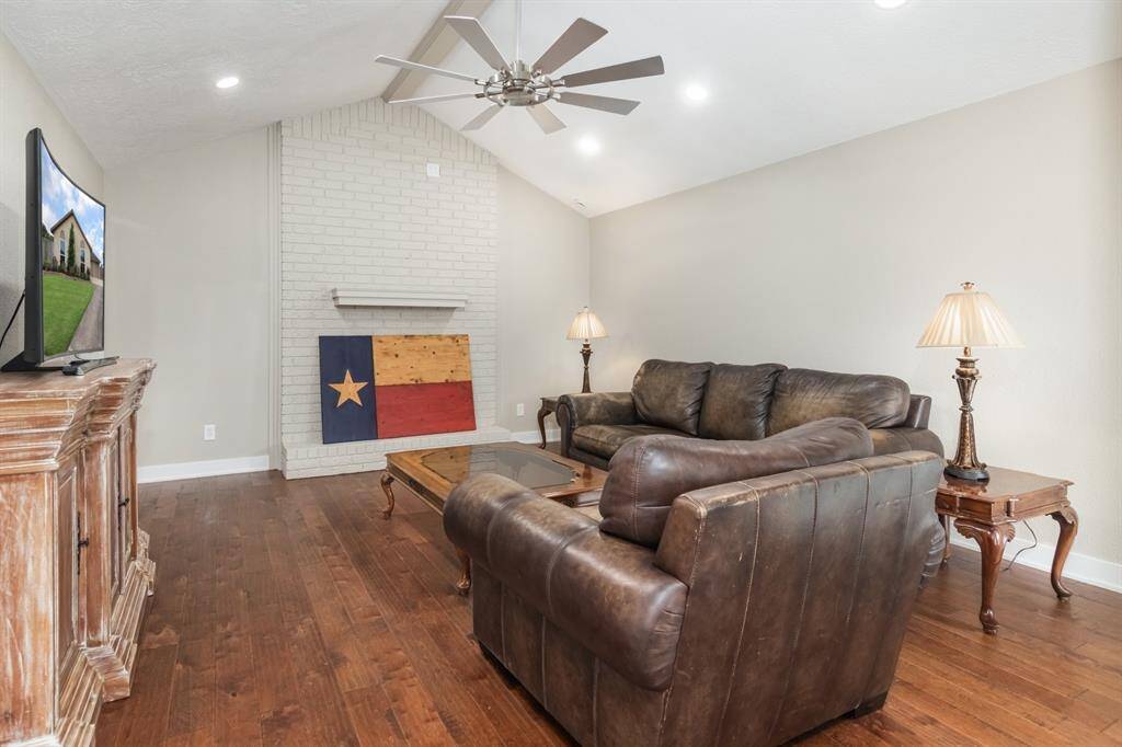 Cozy fireplace (behind the flag).