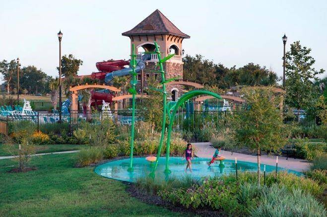 Perfect for family fun, this refreshing pool area features a fun-filled splash pad for the kids. Located within the Riverstone community, this amenity offers a vibrant and inviting atmosphere where residents can enjoy the warm weather in style.