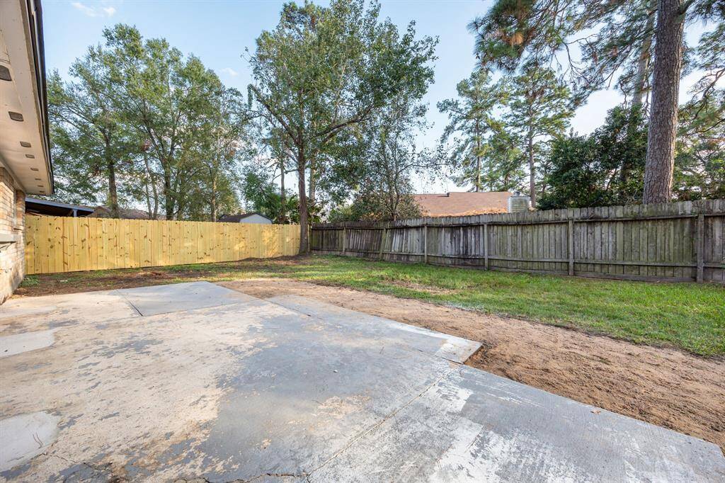 Come and see this sprawling backyard with its spacious patio. There is plenty of room for the kids to play and adults to relax!