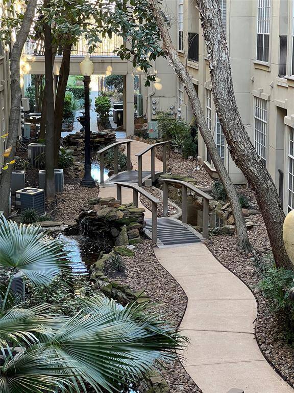 Balcony faces this beautiful courtyard.