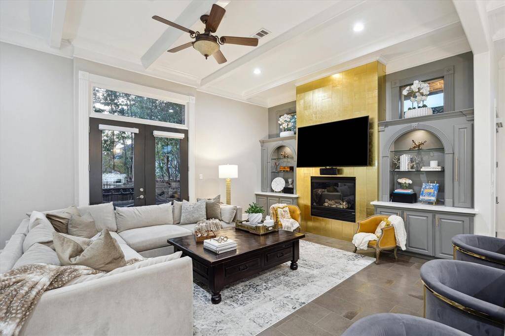 Family Room featuring more French doors and built-ins